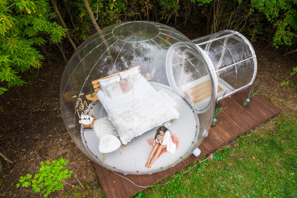 Glamping-bubble-tent-woman-glamping