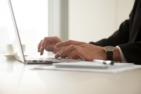 Laptop-man-hands-typing-laptop